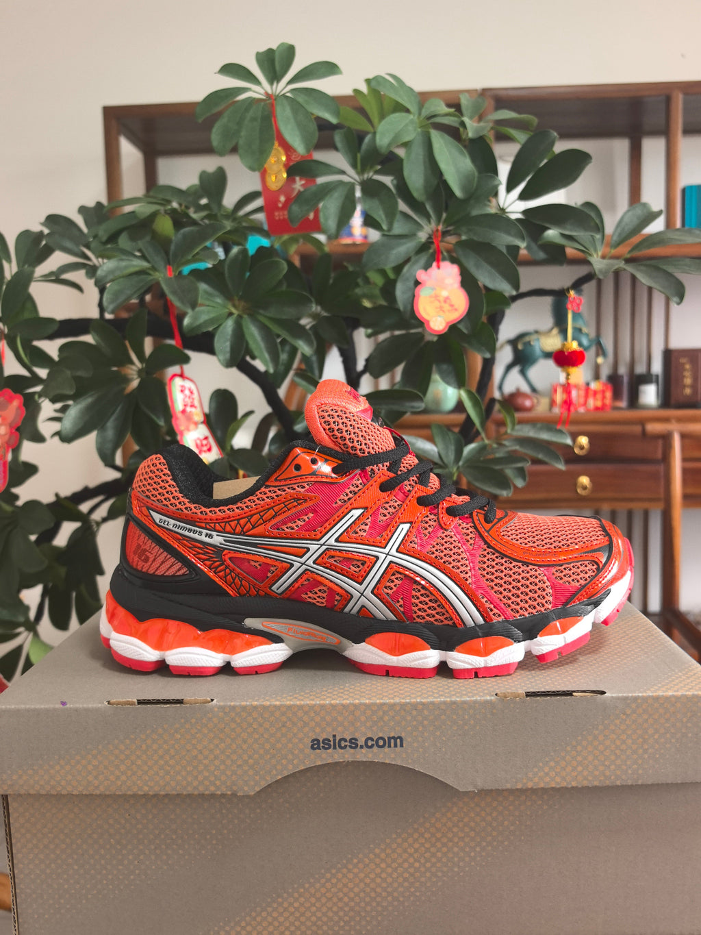 ASICS GEL-KAYANO 14 Sneakers in Orange and Pink - product image from the listing.