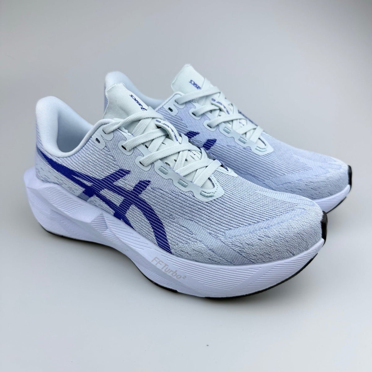 White and Blue ASICS N10 Running Shoes - product image from the listing.