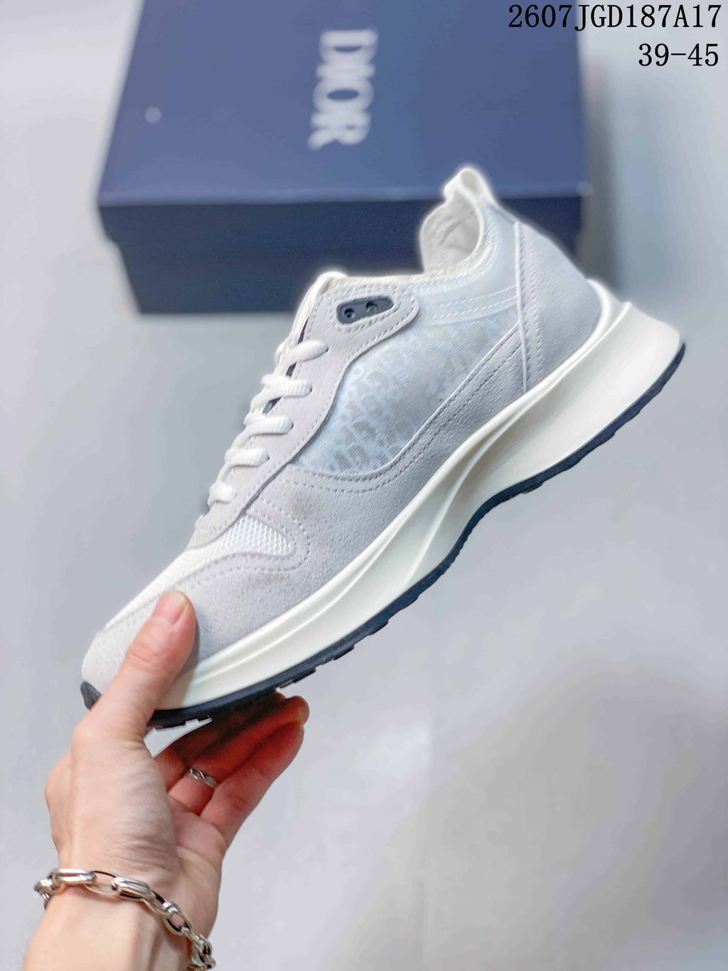 Dior B25 Runner Low-Top Sneakers in White and Gray 2607JGD187A17 - product image from the listing.