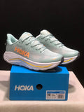 HOKA Challenger 8 Trail Running Shoes, Sage and in Coral - product image from the listing.