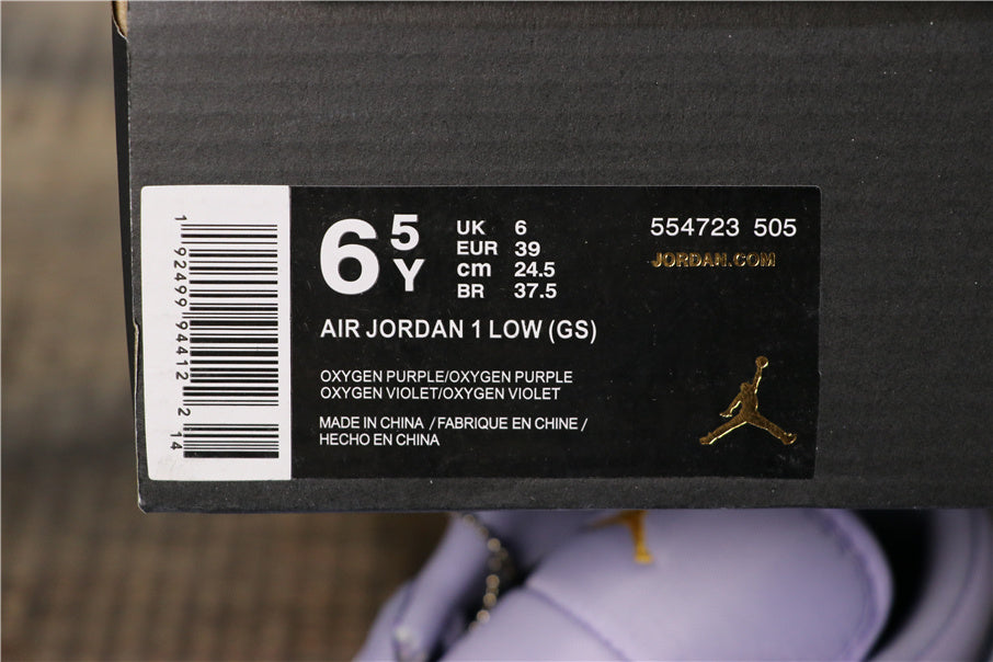Air Jordan 1 Low Oxygen Sneakers in Purple 554723-505 - product image from the listing.