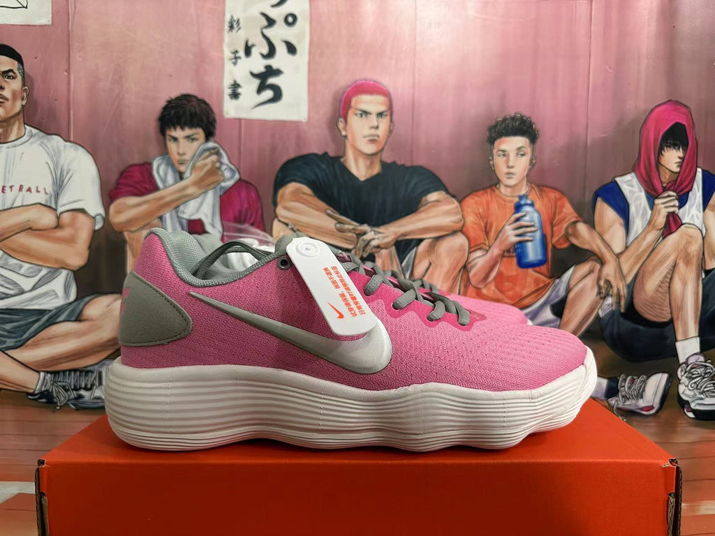 Nike Low-Top Sneakers in Pink and Grey - product image from the listing.