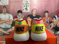 Pink and Volt Yellow Nike Basketball Shoes - product image from the listing.