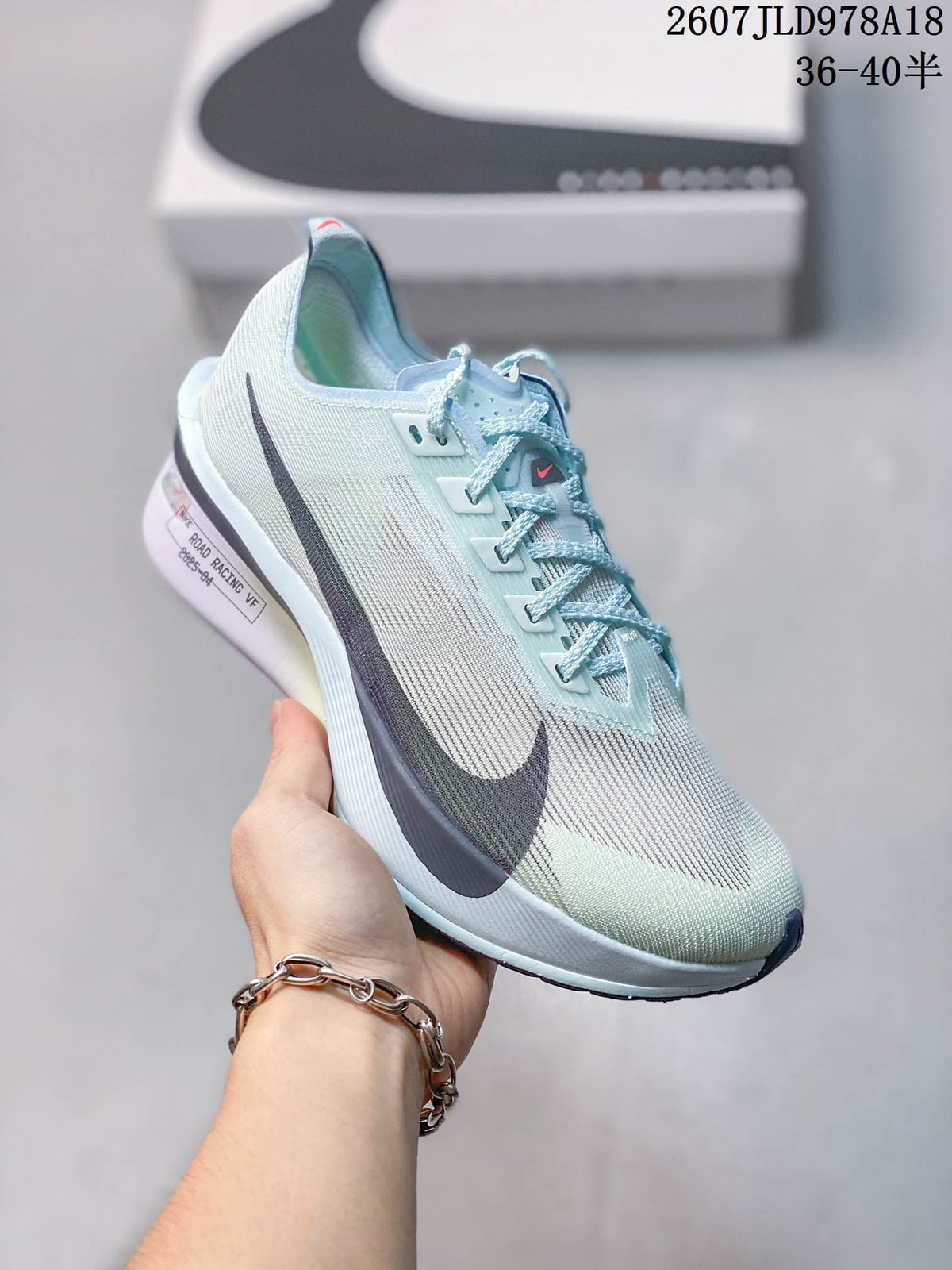 Nike ZoomX Vaporfly NEXT% 4 Racing Trainers 2607JLD978A18 - product image from the listing.