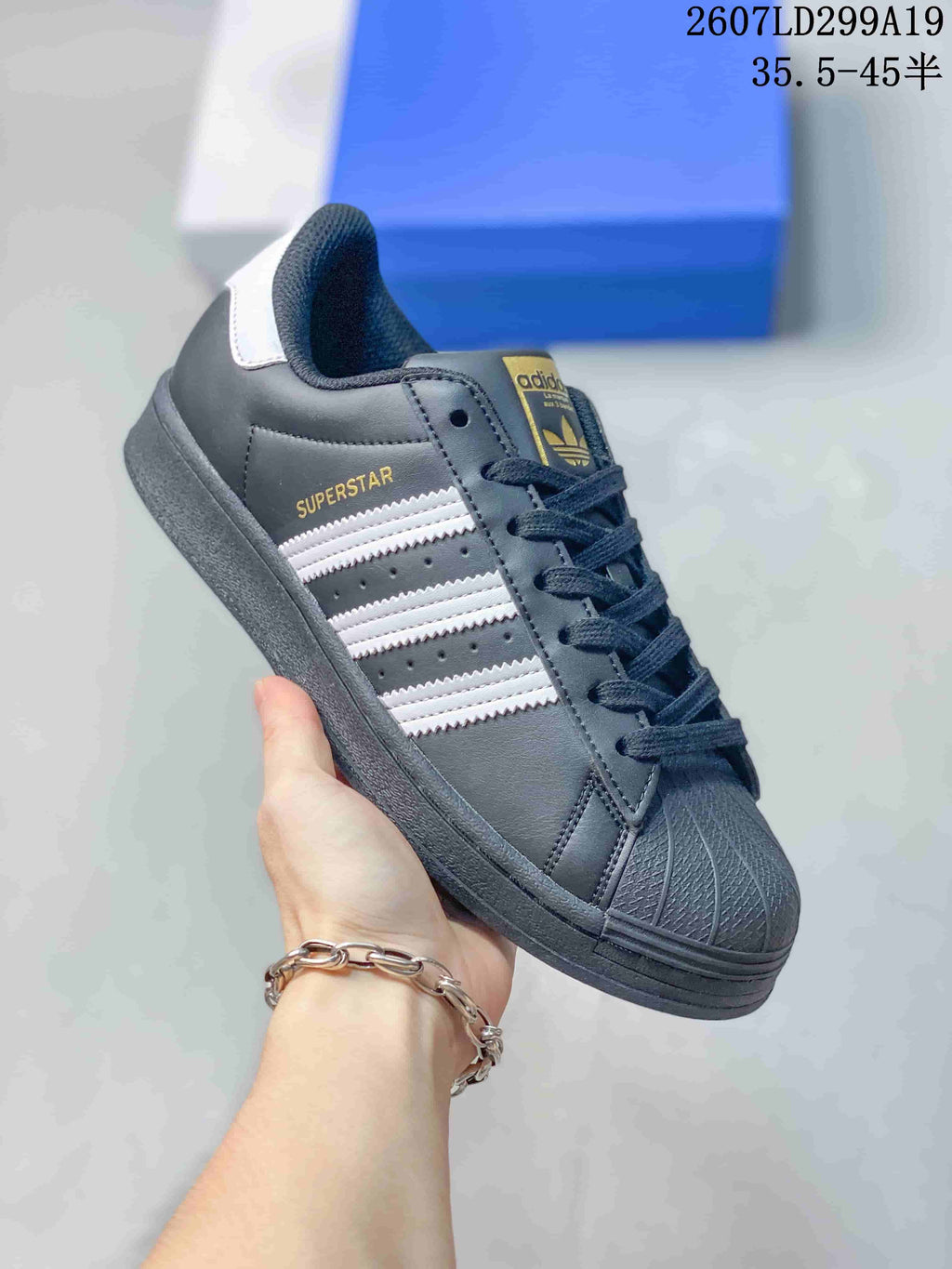 adidas Superstar Sneakers in Black White 2607LD299A19 - product image from the listing.