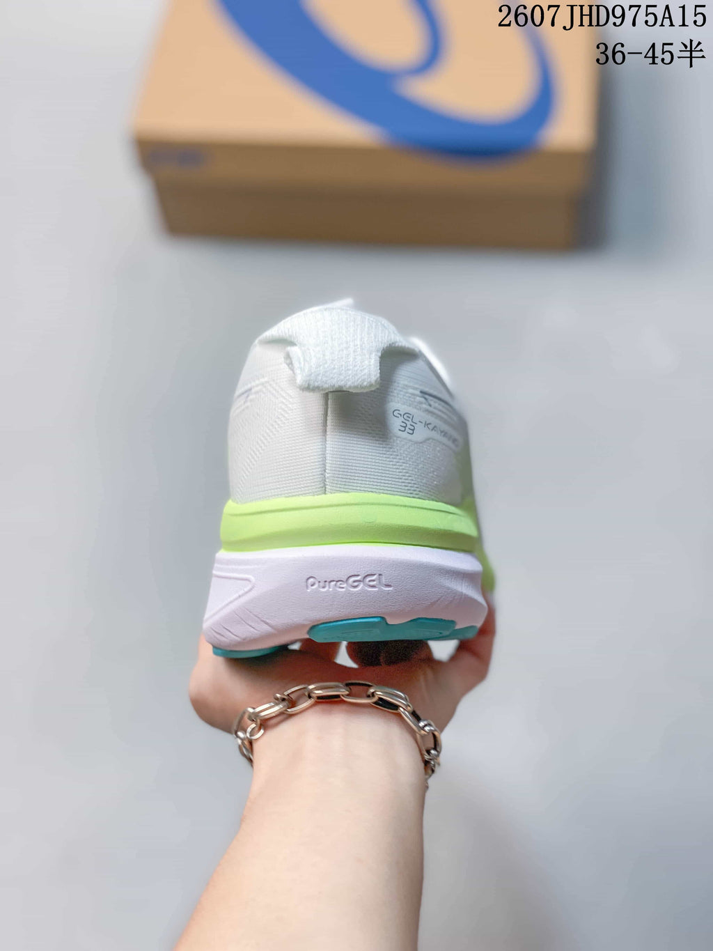 ASICS Gel-Kayano 33 Running Shoes in White Lime Blue 1011C167-402 - product image from the listing.
