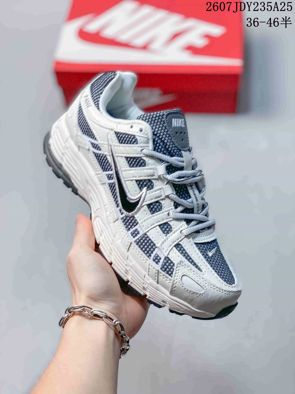Nike P-6000 Trainers in Gray and White Colorways - product image from the listing.