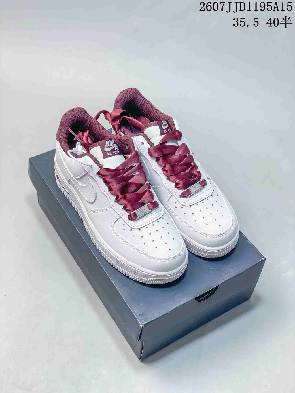 Nike Air Force 1 '07 Low Sneakers in White Burgundy - product image from the listing.