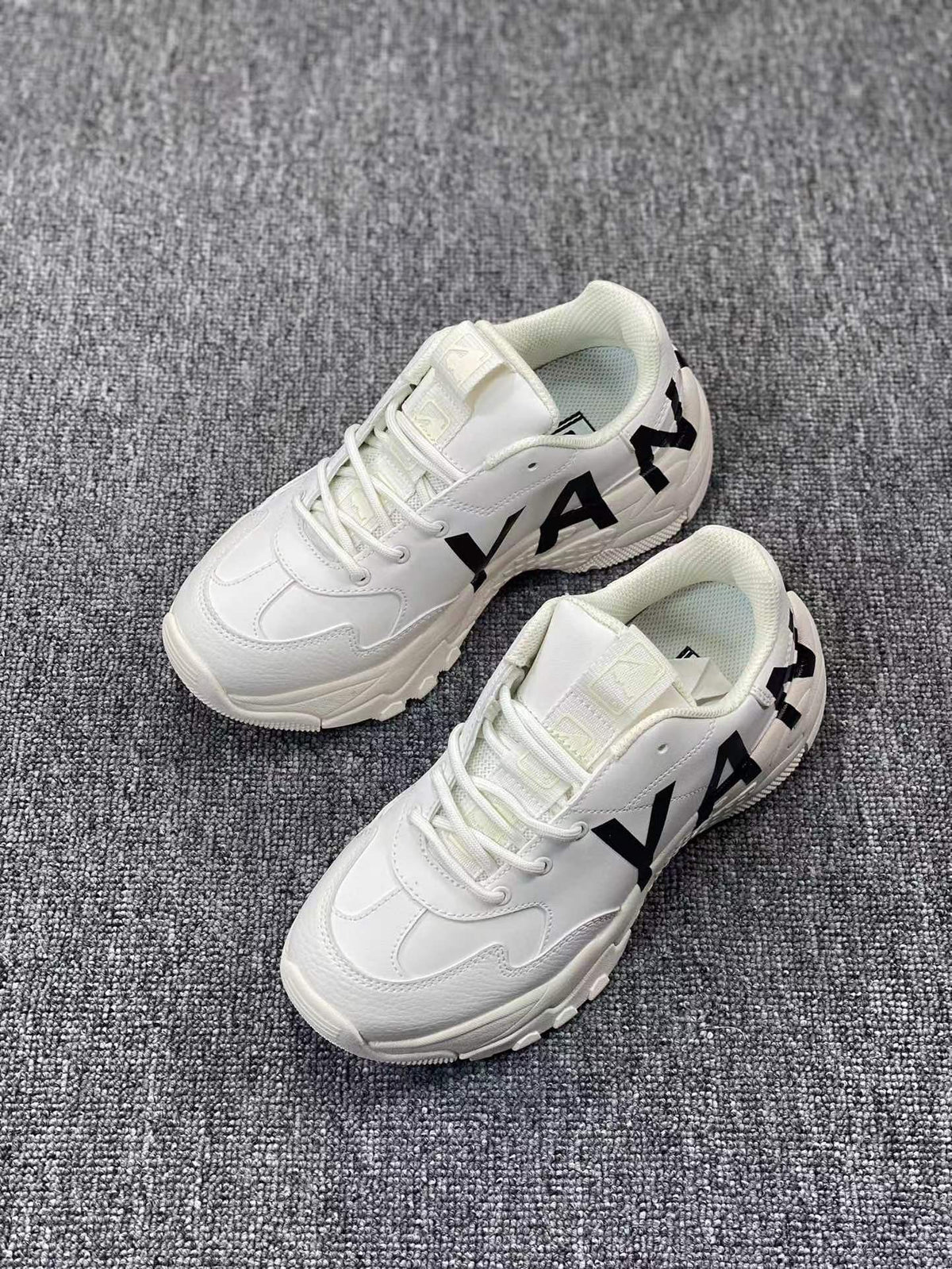 White Chunky Lace-Up Trainers with Black Lettering - product image from the listing.