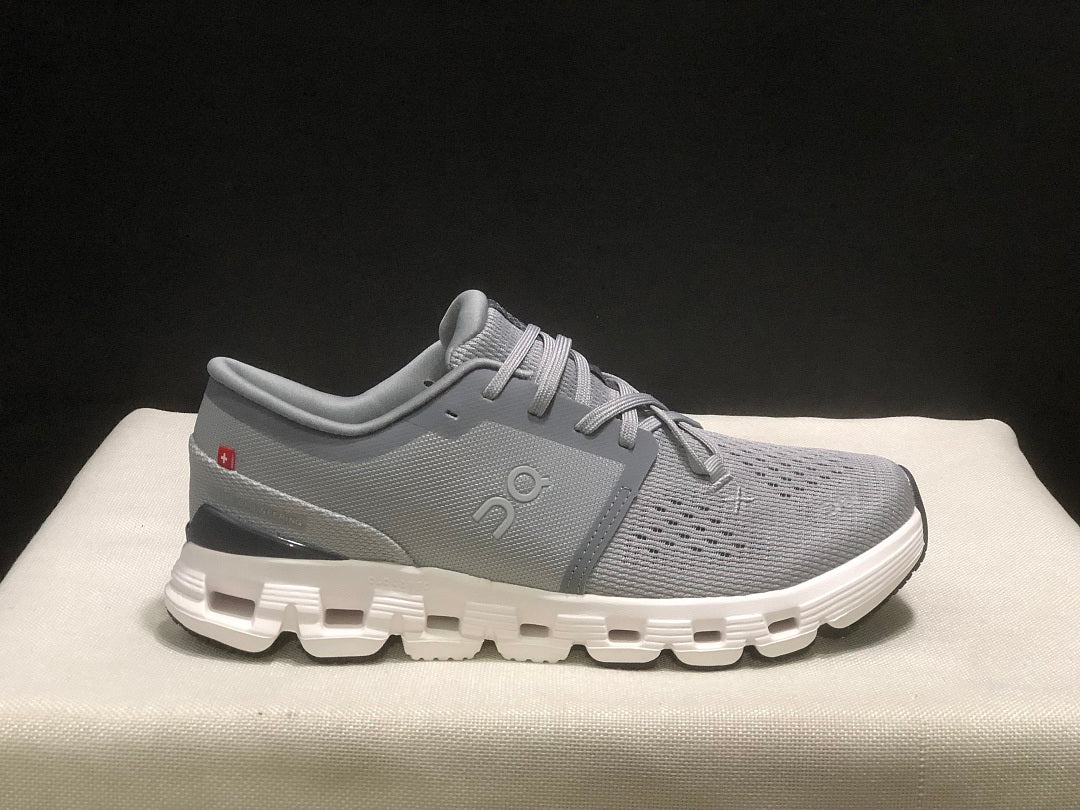 On Cloud X 4 Sneakers in Alloy and in Ivory - product image from the listing.