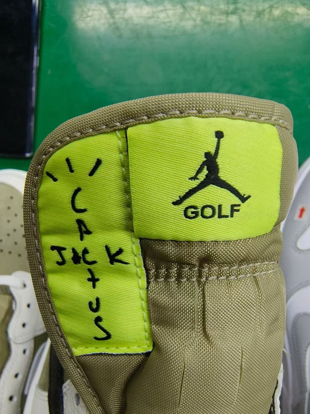 Jordan 1 Low Golf Travis Scott FZ3124-200 in Olive - product image from the listing.