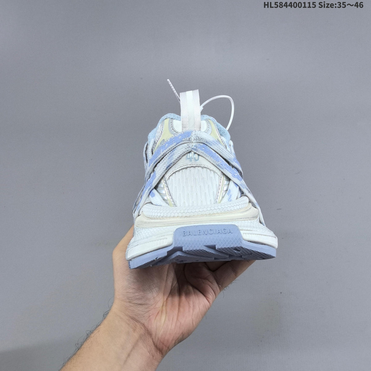 Balenciaga Phantom Trainers in White and Light Blue, Style 825597 - product image from the listing.