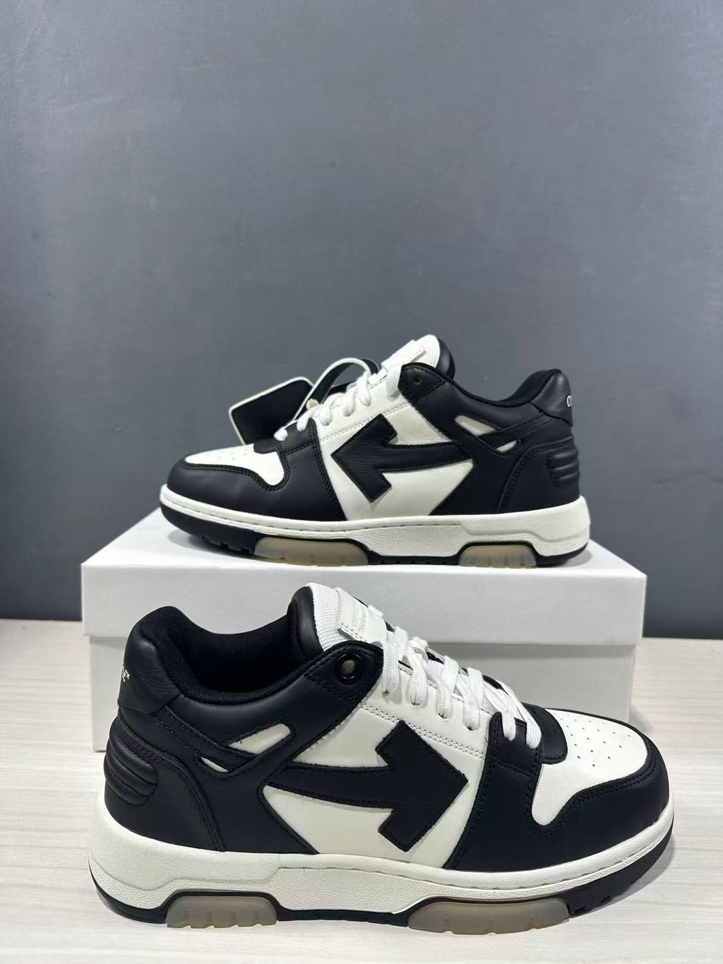 Off-White Out Of Office Low-Top Sneakers in Black White OMAI89C99LEA0070110 - product image from the listing.