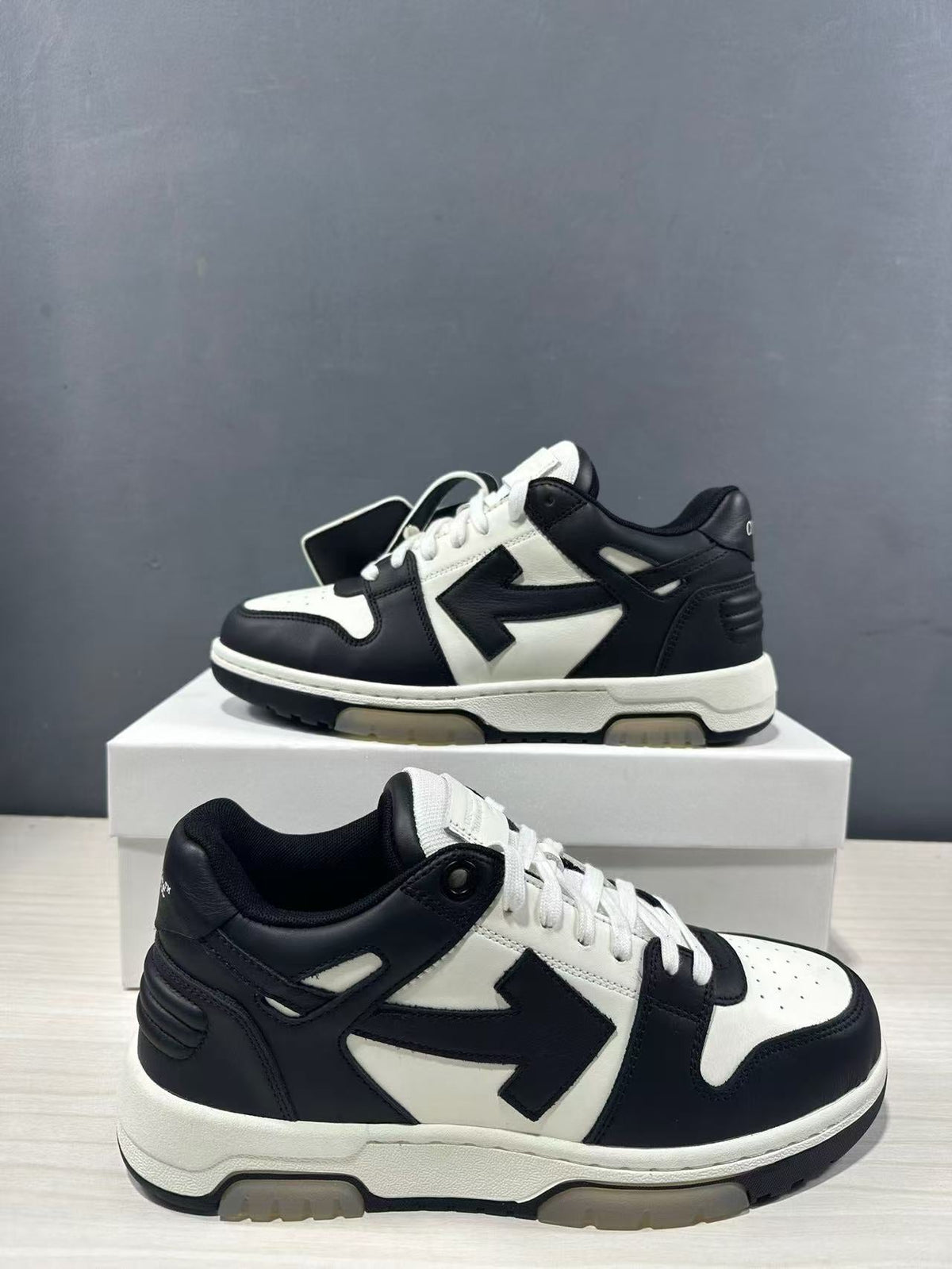 Off-White Out Of Office Low-Top Sneakers in Black White OMAI89C99LEA0070110 - product image from the listing.