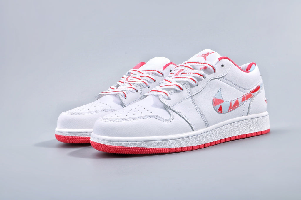 Women's Nike Air Jordan 1 Low White and Pink Sneakers - product image from the listing.