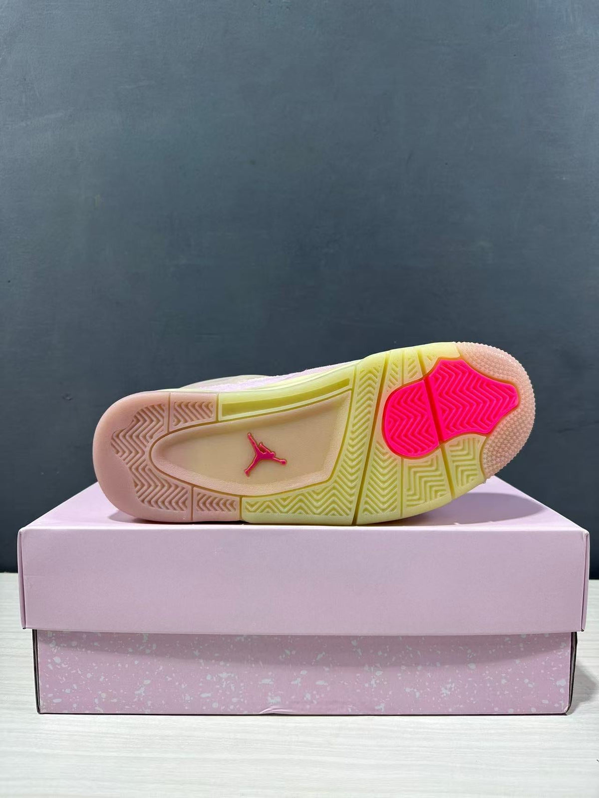 Air Jordan 4 Retro Pink Sneakers IB6716-600 - product image from the listing.