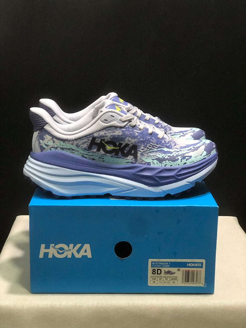 Purple and Mint HOKA Stinson 7 Running Shoes - product image from the listing.