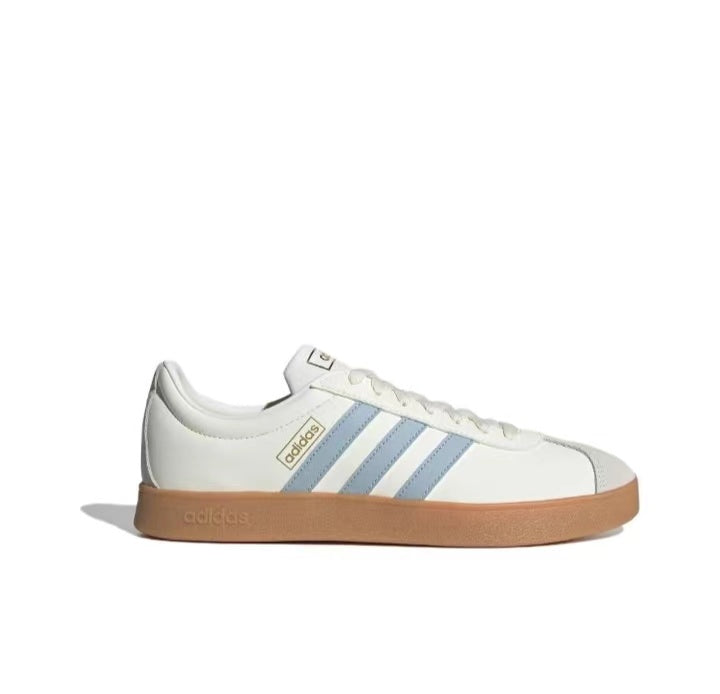 adidas Low-Cut Sneakers with Blue Stripes and Gum Sole - product image from the listing.