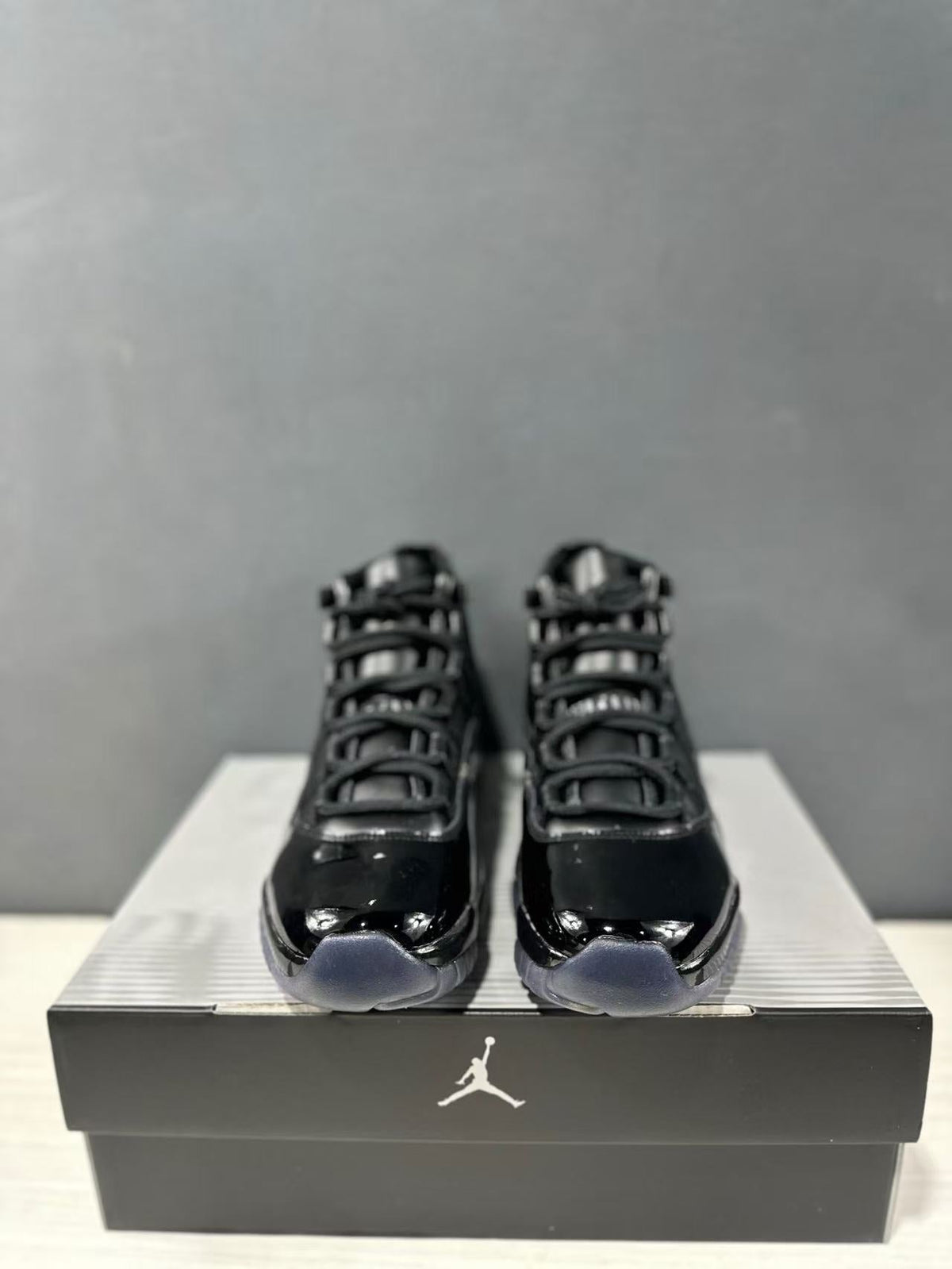 Comme des Garçons × Jordan Air Jordan 11 Sneakers in Black - product image from the listing.