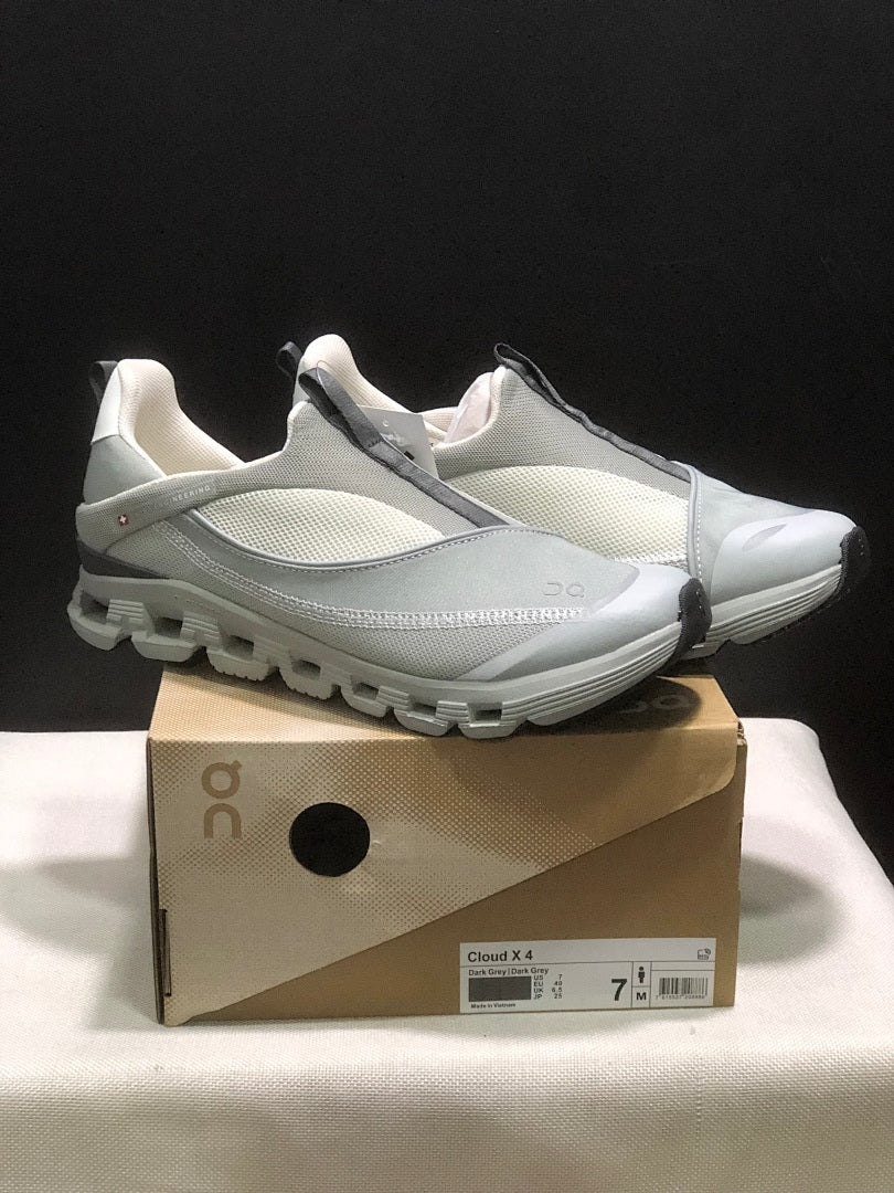 On Cloud 4 Coast Slip-On Sneakers, in Dark Grey - product image from the listing.