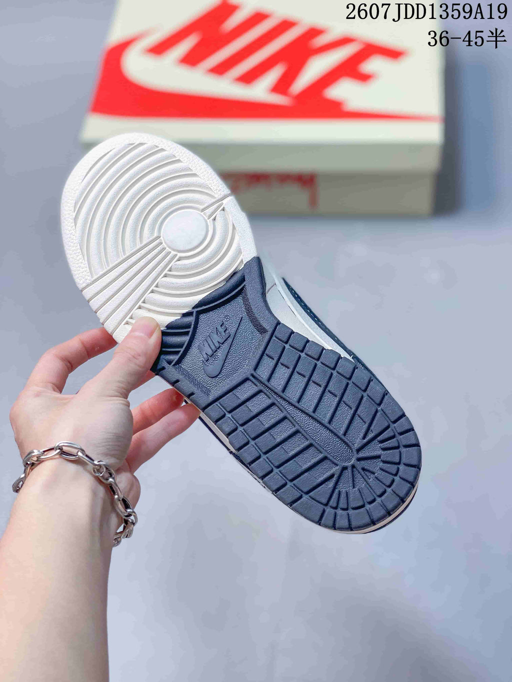 Air Jordan 1 Low Navy White Sneakers 2607JDD1359A19 - product image from the listing.