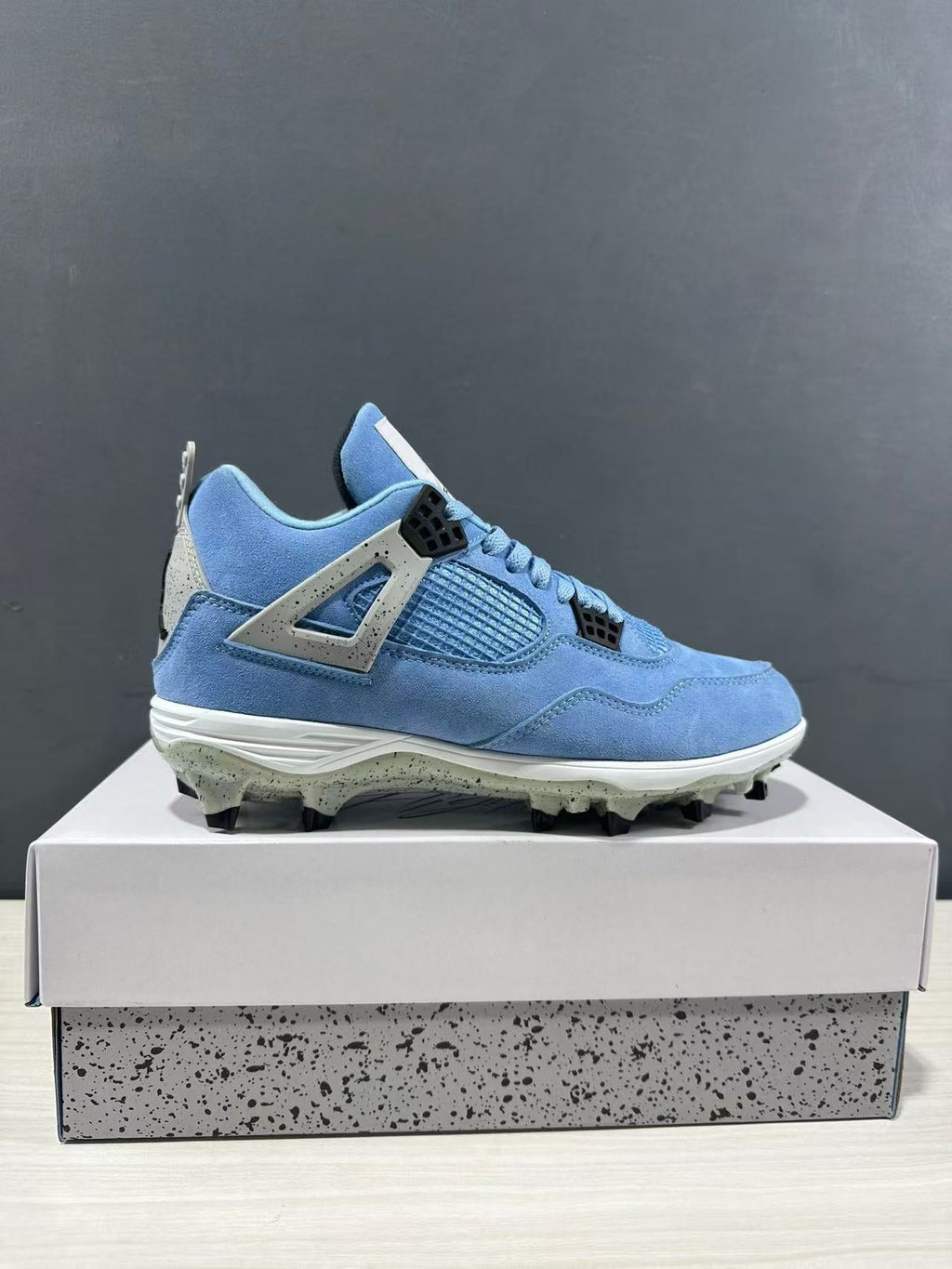Air Jordan 4 University Blue Cleats CT8572-400 - product image from the listing.