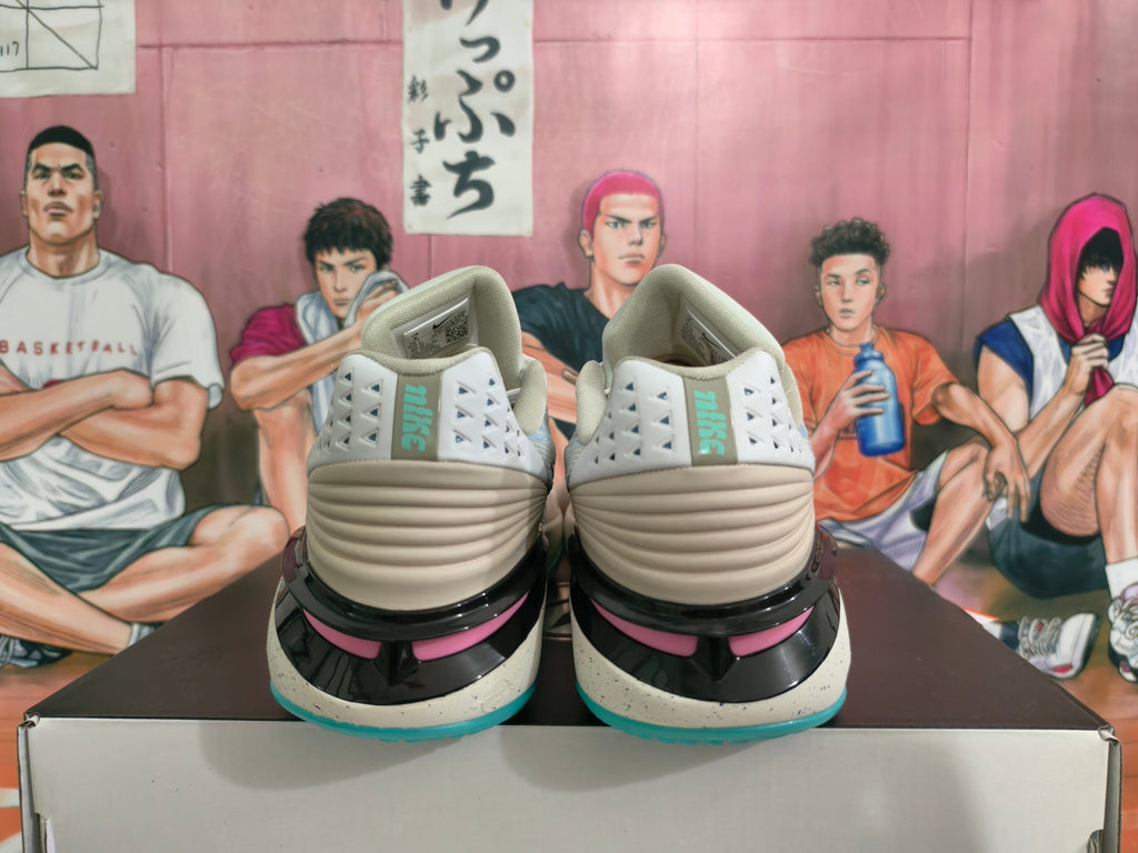 Nike Basketball Footwear in Gray Blue with Pink Accents - product image from the listing.