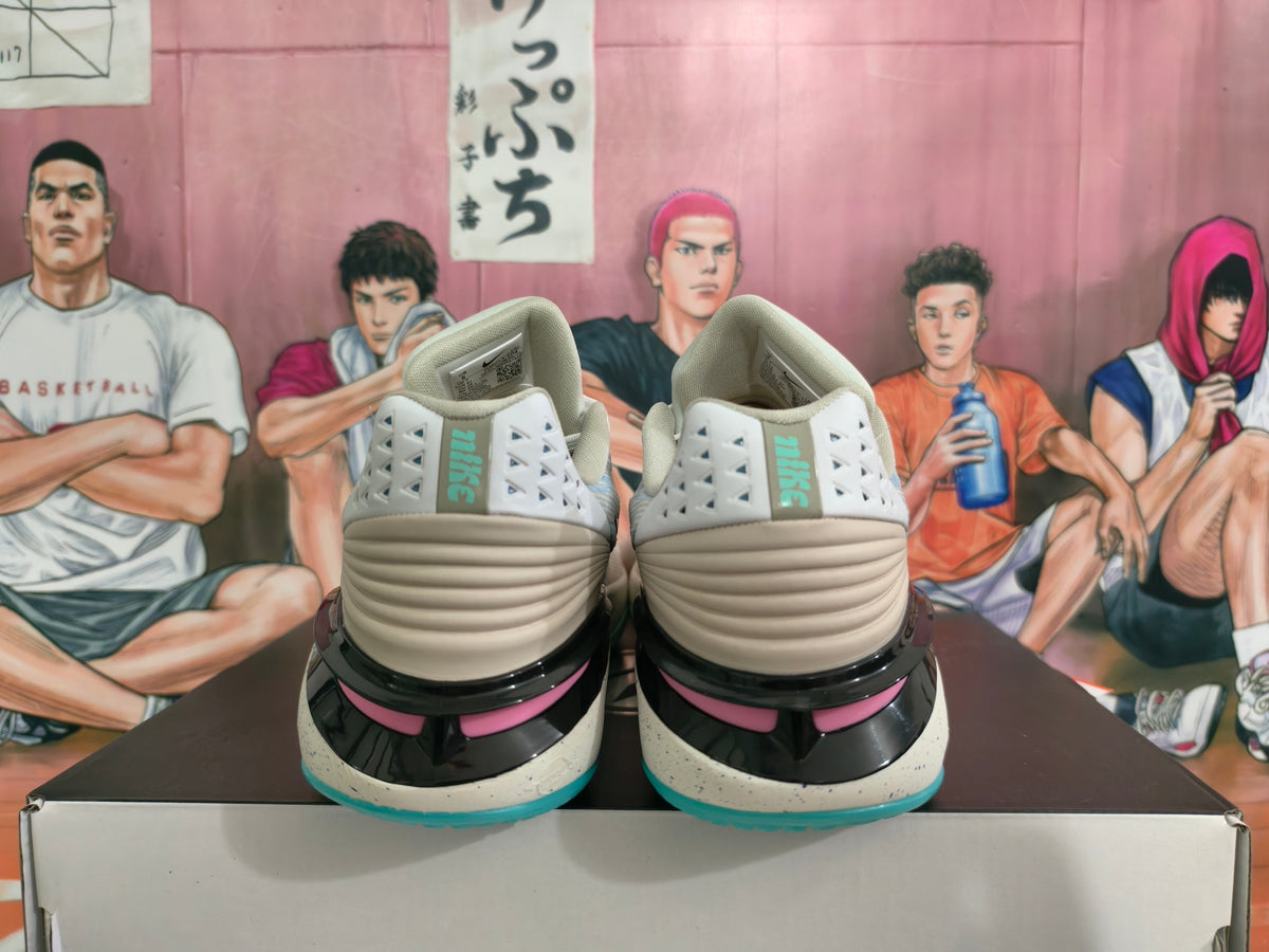 Nike Basketball Footwear in Gray Blue with Pink Accents - product image from the listing.