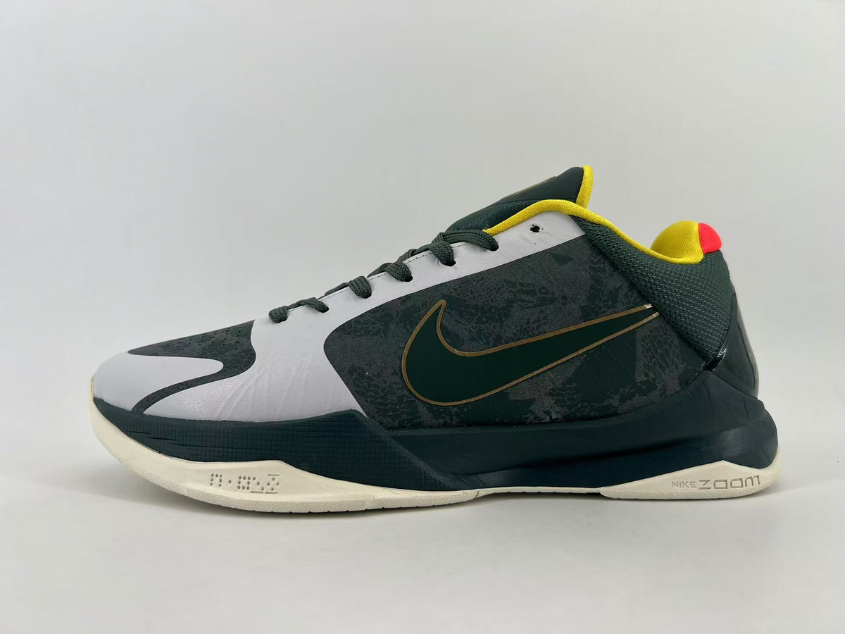 Nike CD4991-300 Basketball Sneakers, in Dark Green and Yellow - product image from the listing.