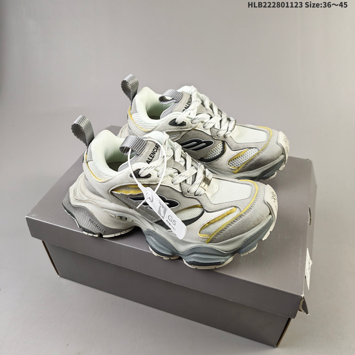 Gray and White Balenciaga Monday Low-Top Sneakers - product image from the listing.