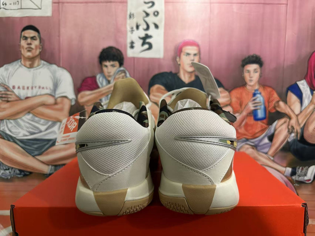 White and Yellow Nike Basketball Shoes - product image from the listing.