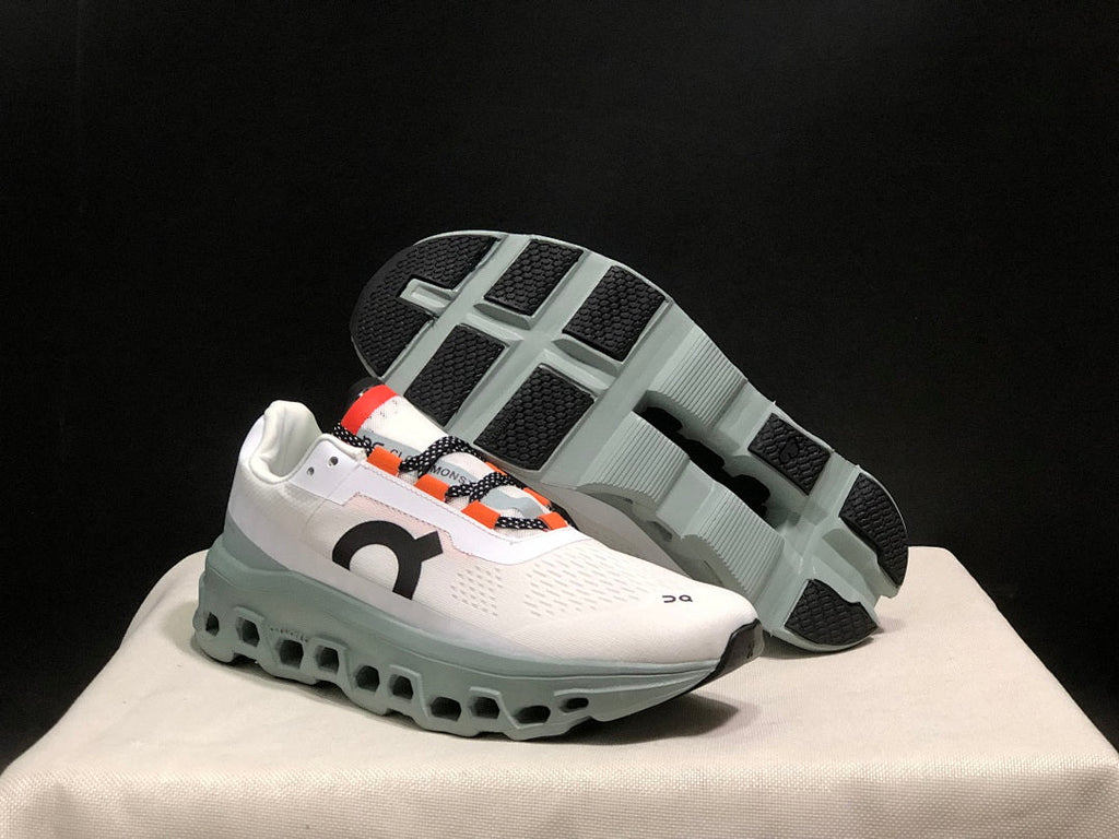 White and Blue On Cloudmonster Sneakers - product image from the listing.