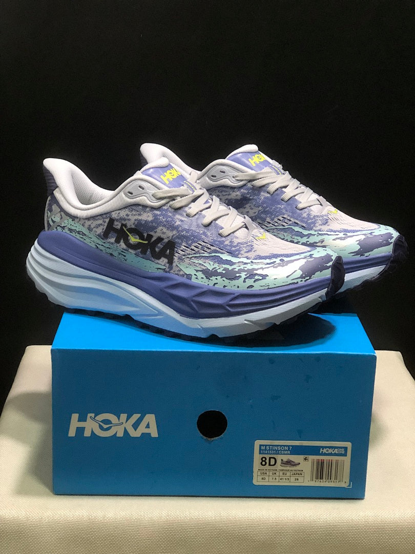 Purple and Mint HOKA Stinson 7 Running Shoes - product image from the listing.