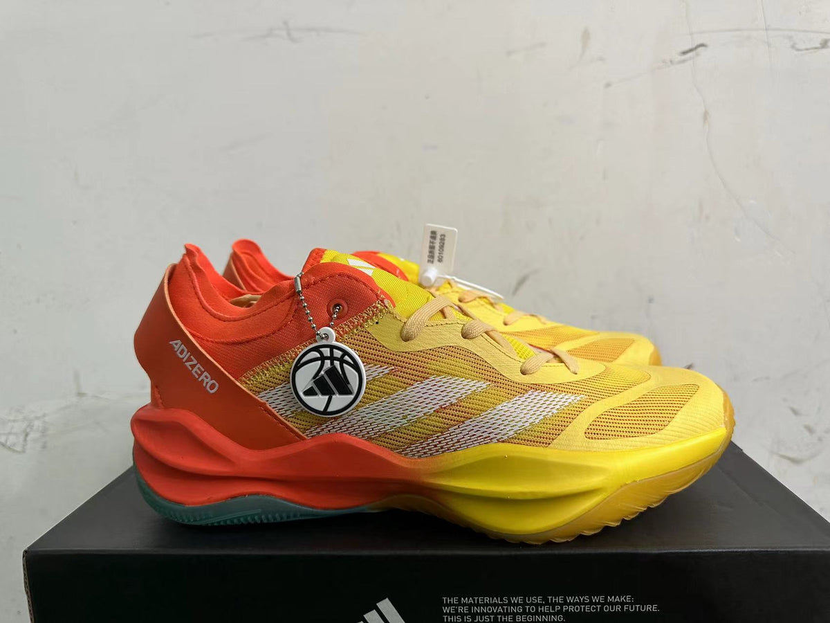 Adidas Adizero Basketball Shoes in Yellow Orange - product image from the listing.