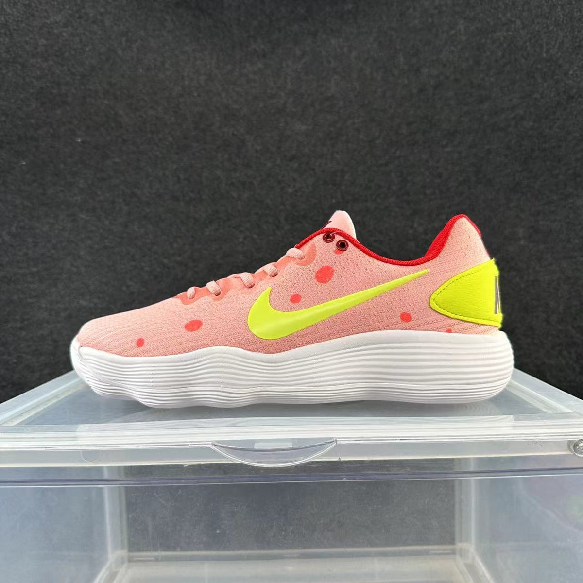 Nike Low-Top Sneakers in Pink and Yellow - product image from the listing.