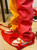 A Bathing Ape BAPE STA Low Sneakers in White Orange - product image from the listing.