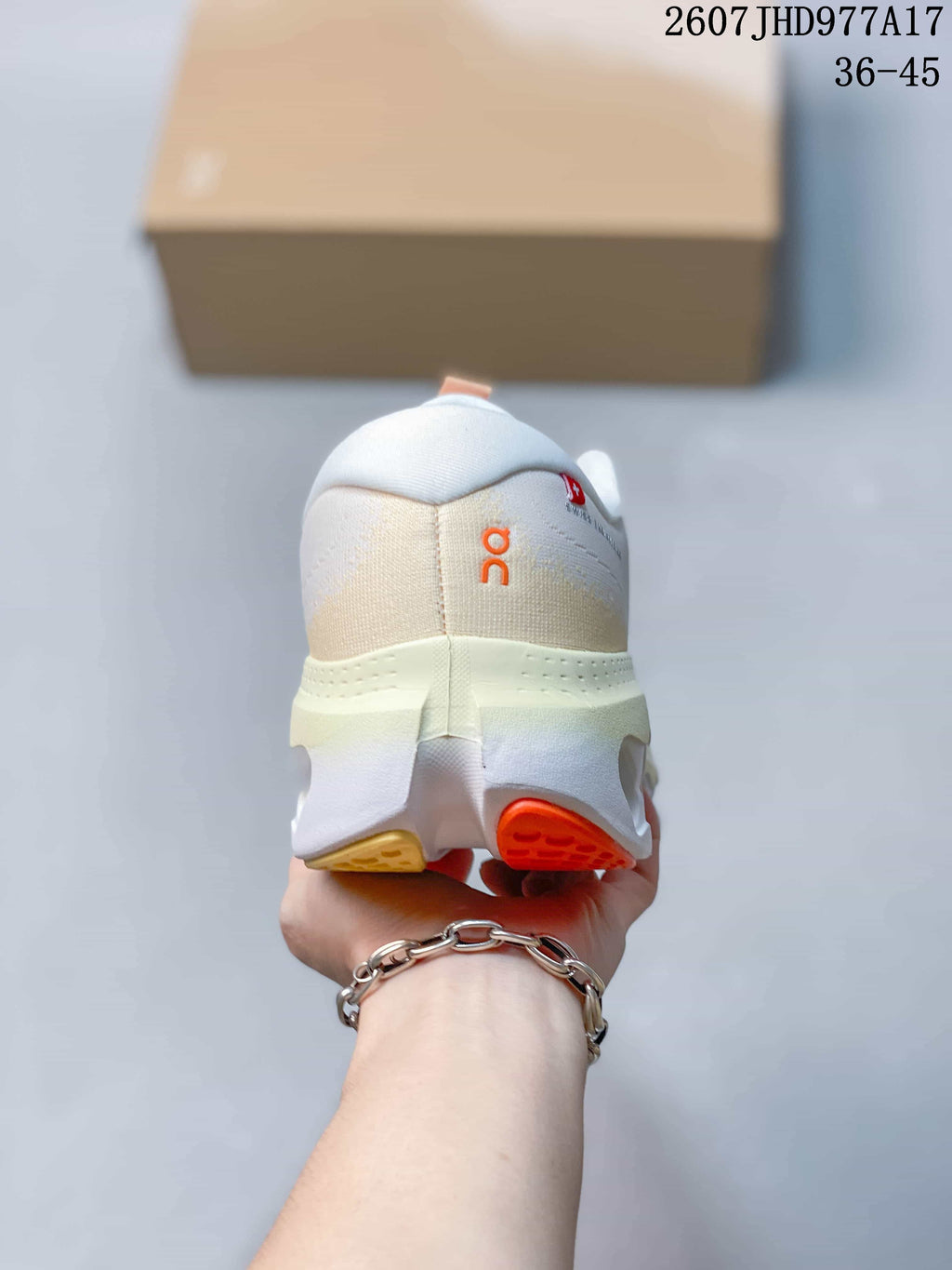 On Cloudtilt Sneakers in White Orange - product image from the listing.