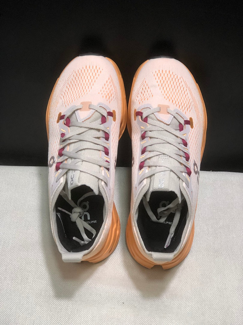 On Cloudsurfer Max Shoes for Running in Pearl and Tangerine - product image from the listing.