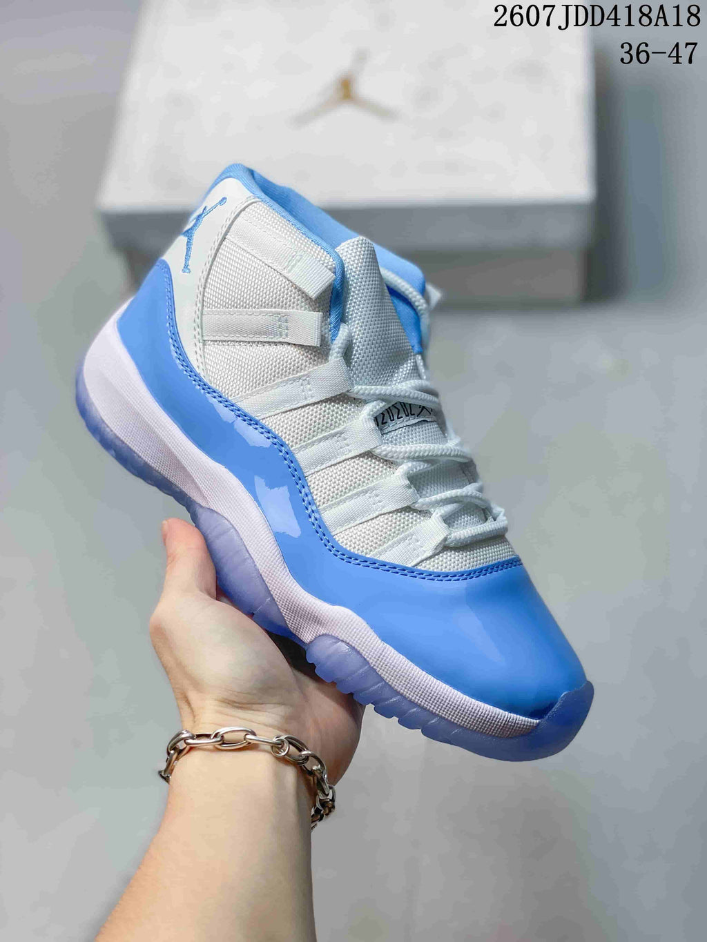 Air Jordan 11 Retro High-Top Sneakers Blue and White - product image from the listing.