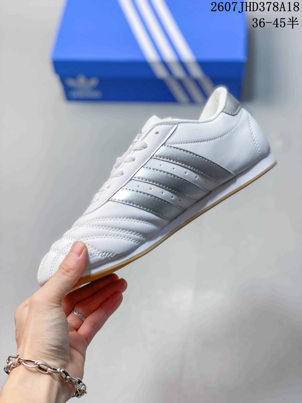 adidas Taekwondo SMIL-LS Low-Top Sneakers in White Silver - product image from the listing.