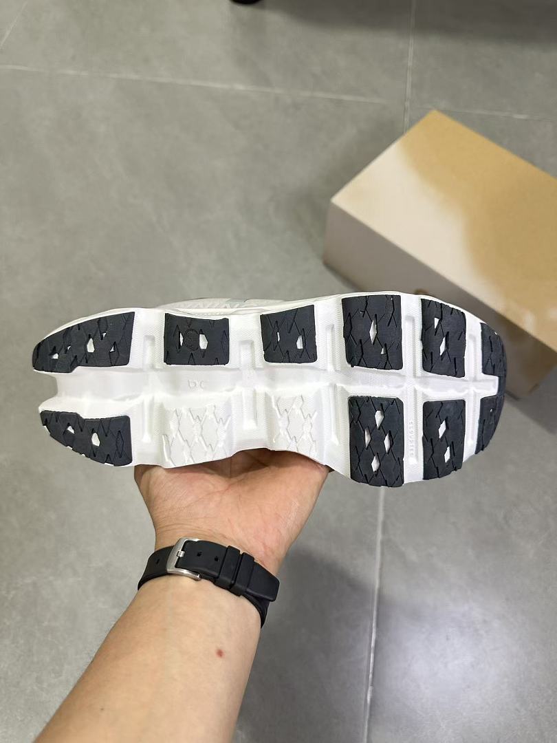 Gray and White On Running Cloudmonster Sneakers - product image from the listing.
