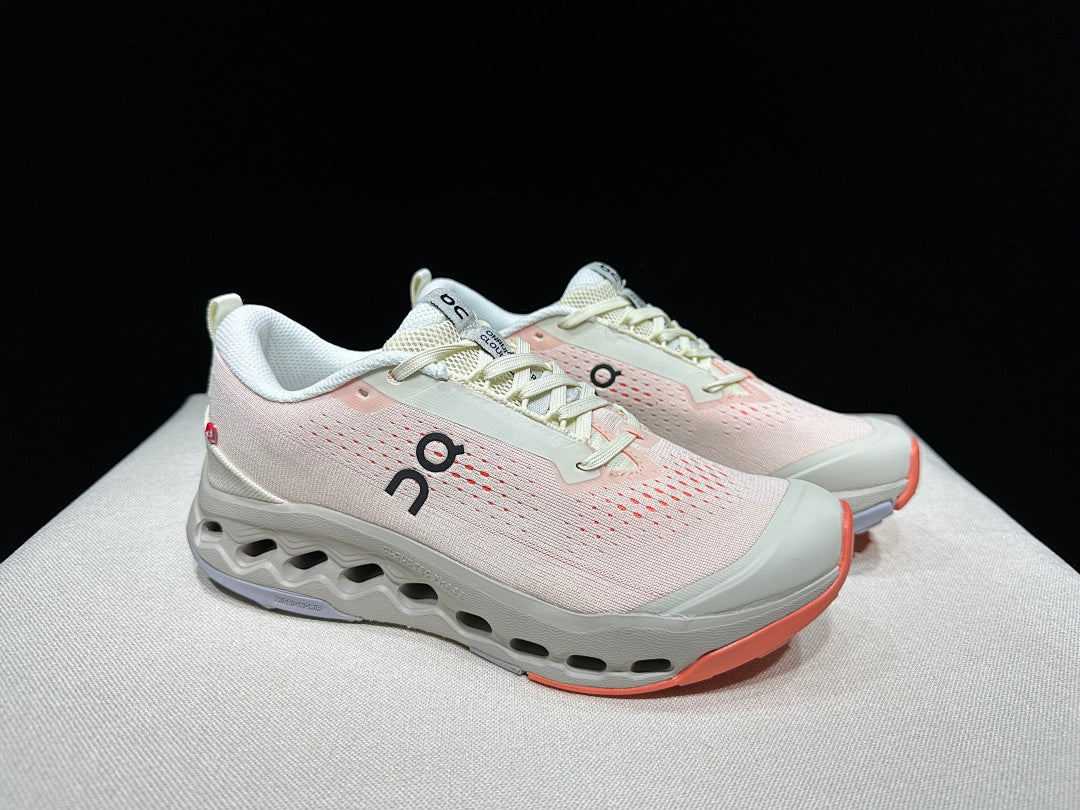 On Cloudsurfer Trail 2 Trail Running Shoes, in Ivory and Coral - product image from the listing.