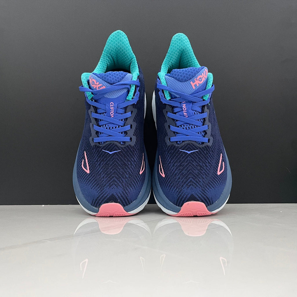 Navy and Light Blue HOKA Clifton 9 Running Shoes - product image from the listing.