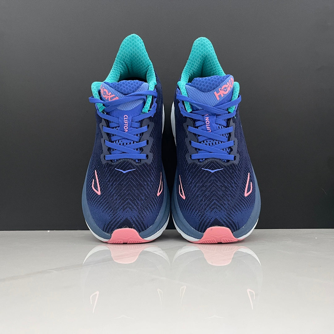 Navy and Light Blue HOKA Clifton 9 Running Shoes - product image from the listing.