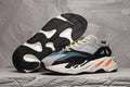 Men's Adidas 700 Sneakers in Gray, Black and Orange - product image from the listing.