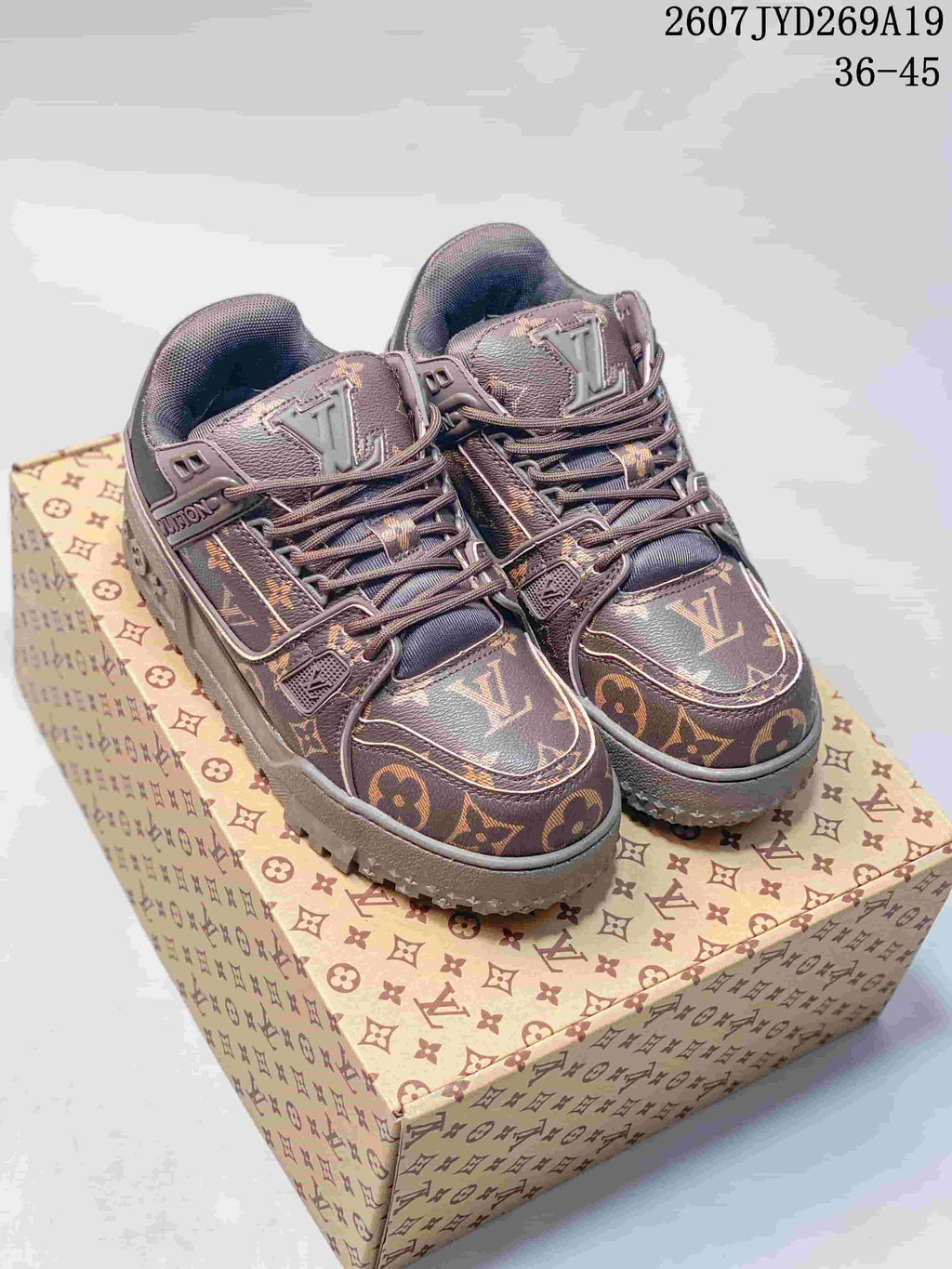 Louis Vuitton Trainer Maxi Low-Top Sneakers in Brown - product image from the listing.