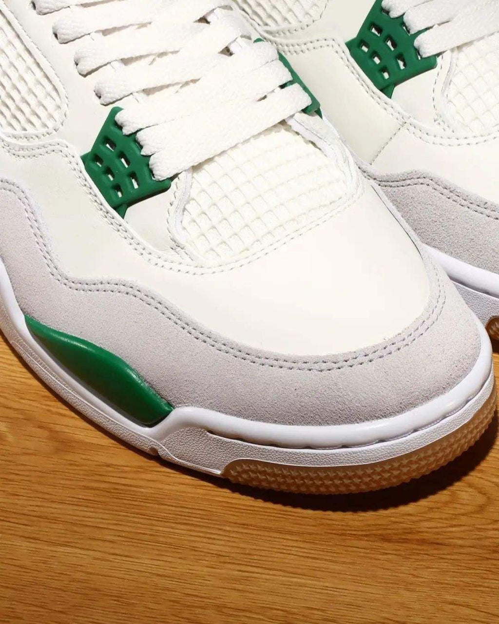 Nike SB x Air Jordan 4 Pine Sneakers in Green DR5415-103 - product image from the listing.
