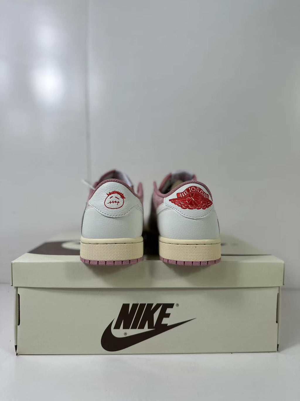 Nike Air Jordan 1 Low Travis Scott in White Pink DM7866-600 - product image from the listing.