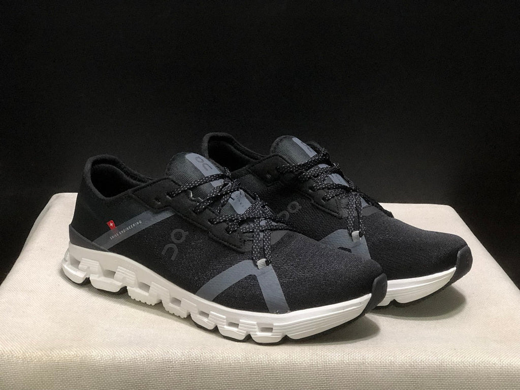 Black and White On Cloud X 4 AD Sneakers - product image from the listing.