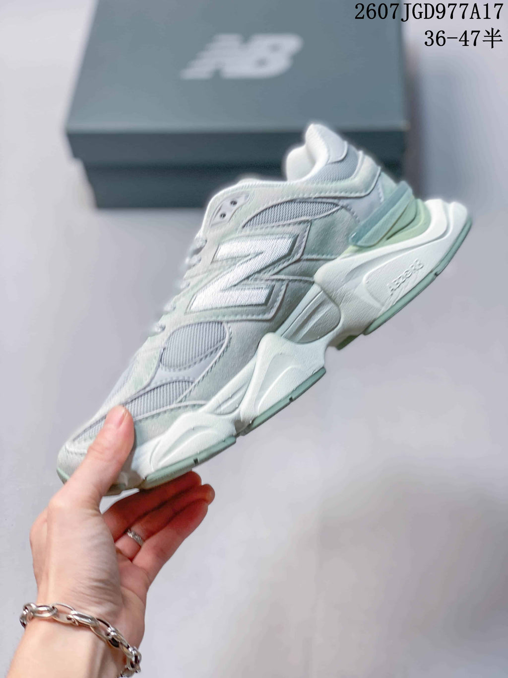New Balance 9060 Sneakers in Mint Green and White - product image from the listing.